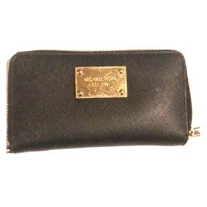 Michael Kors black with gold plate Wallet